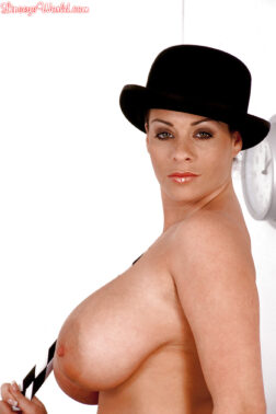 79408400 006 1583 252x378 - Busty solo MILF Linsey Dawn McKenzie showing in hat while baring huge knockers